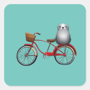 Cute little cartoon seal on a bicycle