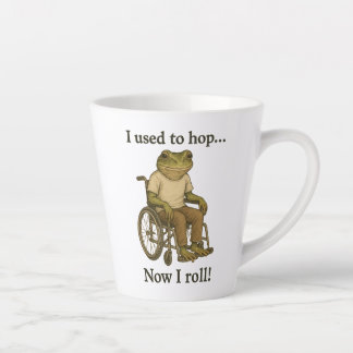 Cute little frog in a wheelchair being positive. latte mug