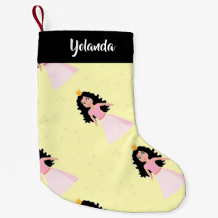 Cute little princess on yellow small christmas stocking