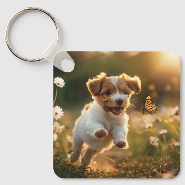 Cute little puppy chasing after a butterfly key ring (Front)