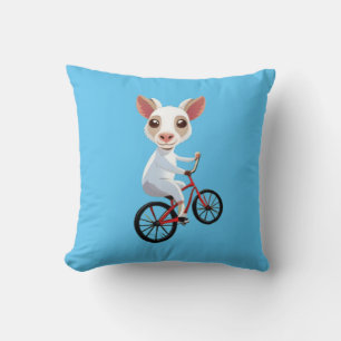 Cute little white goat on a bicycle cushion