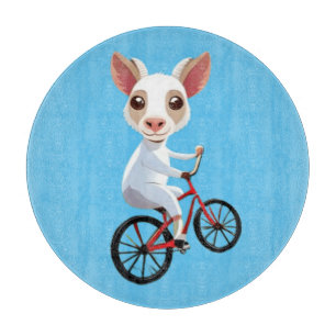 Cute little white goat on a bicycle cutting board