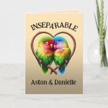 Cute Lovebirds Cuddling in a Heart Shaped Bough