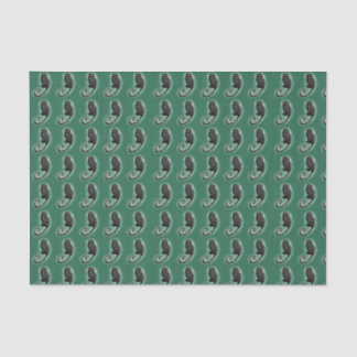 Cute Marmoset on green tissue paper