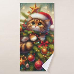 Cute, mischievous cat in the Christmas tree Bath Towel