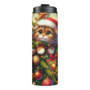 Cute, mischievous cat in the Christmas tree Thermal Tumbler