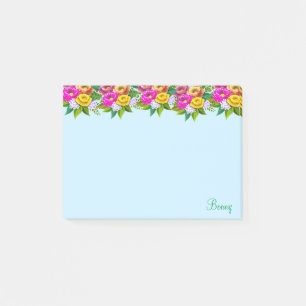 Cute multicolored flowers on light blue post-it notes