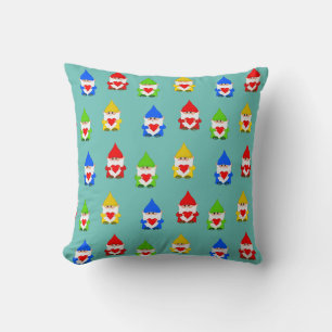 Cute multicolored gnomes on teal cushion