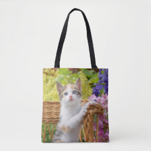 Cute Nosy Baby Cat Kitten in a Flowering Garden Tote Bag