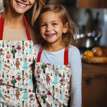 Cute Nutcracker Christmas Holiday Pattern Apron<br><div class="desc">Beautiful, whimsical, and magical Christmas nutcracker ballet apron. Hand drawn festive illustrations. This design features nutcracker mouse king, nutcracker ballet dancers, candy cane, flowers, holly, Clara, Drosselmeyer, Harlequin, Sugar Plum Fairy are all incorporated into this nutcracker Christmas pattern. You can order this design in different sizes, for you and your...</div>