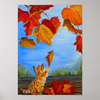 Cute orange cat playing with autumn leaves. Poster