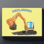 Cute orange excavator digger cartoon plaque<br><div class="desc">This cute orange excavator is enjoying rocks for lunch. Join the construction crew in fun cartoon style!</div>
