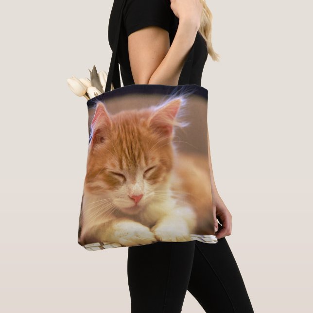 Cute Orange Kitten Falls Asleep Tote Bag (Close Up)
