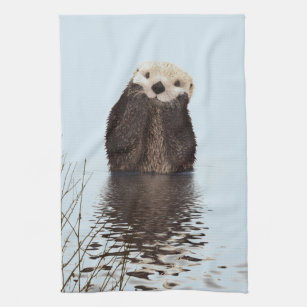 Cute Otter Standing in a Pond Holding his Face Tea Towel