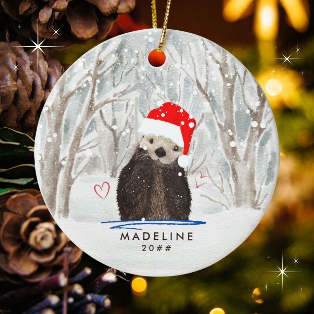 Cute Otter with Santa Hat Kid's Name Ceramic Ornament (Personalize with a name and year. Goes well on multiple other ornaments and products.)