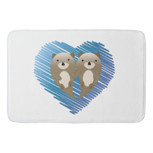 Cute Otters with Blue Heart in the Background Bath Mat
