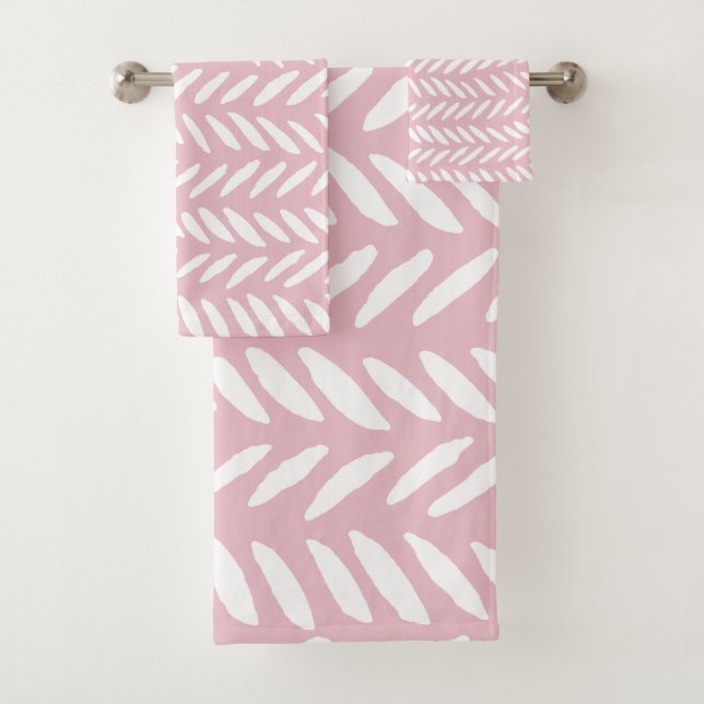 Cute pastel herringbone pattern on pink square bath towel set (Insitu)