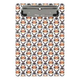 Cute penguin holding sign with the number 99 on it mini clipboard