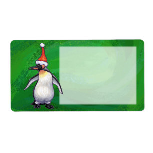 Cute Penguin in Santa Hat on Green