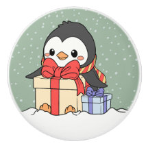 Cute penguin with Christmas gifts in the snowfall
