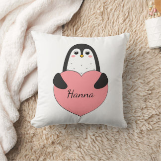 Cute penguin with heart cushion