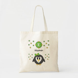 Cute penguin with name stars yellow green tote bag
