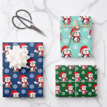 Cute penguins and snowflakes Christmas Wrapping Paper Sheet<br><div class="desc">Colourful Christmas pattern with penguins and snowflakes on a blue,  mint and green background.</div>