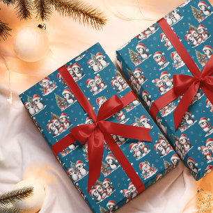 Cute Penguins in Red Hats Blue Christmas Wrapping Paper