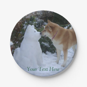 cute photo of dog kissing snowman at christmas paper plate
