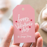 Cute Pink and Red Hearts Happy Valentine's Day Gift Tags<br><div class="desc">Cute Valentine's day gift tags featuring "Happy Valentine's Day" displayed in whimsical,  white hand-lettering surrounded by red hearts on a pink background. Personalise the hand-lettered Valentine's day gift tags with your name. The back of the gift tags feature a pattern of red hearts.</div>