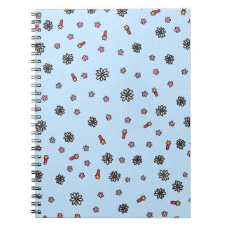 Cute pink and white floral with stars in blue notebook
