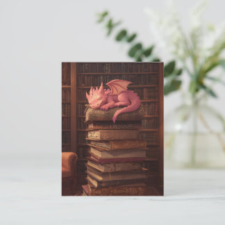 Cute pink dragon sleeping on books postcard