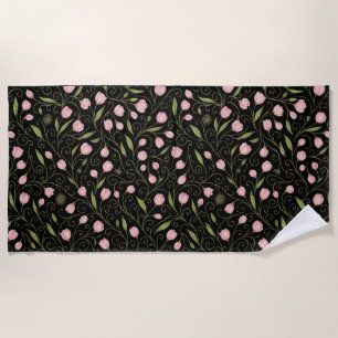 Cute, pink flower on black with repeating pattern beach towel