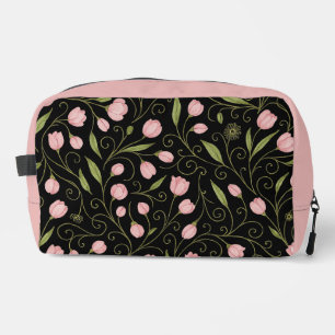 Cute, pink flower on black with repeating pattern dopp kit