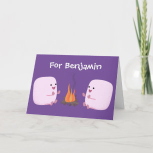 Cute pink marshmallows by camp fire cartoon card