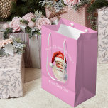 Cute Pink Santa Claus Personalised Girls Christmas Medium Gift Bag<br><div class="desc">Customise this pretty pink from Santa Claus blue gift bag with your own personalised text with your little girl's name in white script. This beautiful old fashioned drawing of Santa's red hat and white beard are the perfect holiday present bags for your children's presents under the tree on Christmas day....</div>
