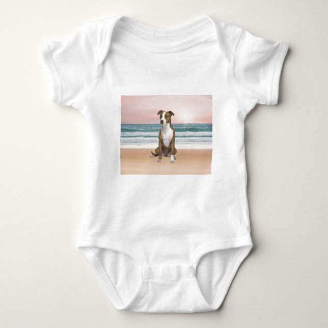 Cute Pitbull Dog Sitting on Beach with sunset Baby Bodysuit (Front)
