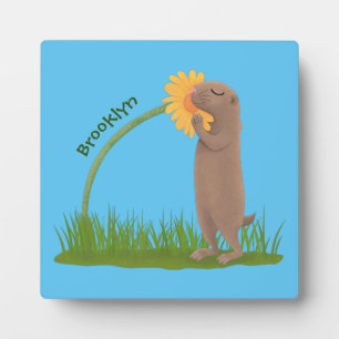 Cute prairie dog sniffing flower cartoon plaque
