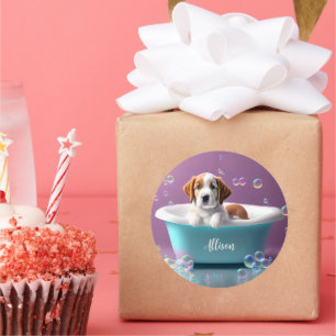 Cute puppy in a bathtub with soap bubbles classic round sticker