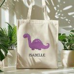 Cute Purple Dinosaur Personalised Tote Bag<br><div class="desc">This girls' tote bag features a cute illustration of a purple and green dinosaur with pink spots and long eyelashes. Personalise it with your child's name in black letters. Makes a great book bag!</div>