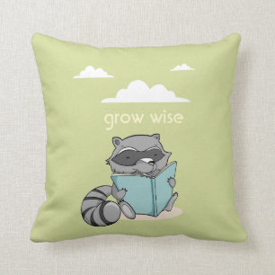 Cute raccoon reading to book. Green children Cushion