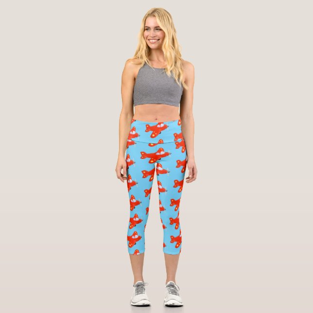 Cute red aeroplane flying cartoon illustration capri leggings (Front)