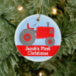 Cute Red Tractor Baby's First Christmas Watercolor Ceramic Ornament<br><div class="desc">This design features our cute red watercolor tractor on a blue watercolor background. Click the customise button for more flexibility in modifying the text! Variations of this design, additional colours, as well as coordinating products are available in our shop, zazzle.com/store/doodlelulu. Contact us if you need this design applied to a...</div>