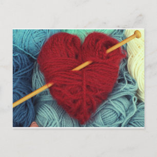 Cute red wool heart with knitting needle postcard