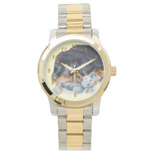 cute rottweiler puppy dog cuddling teddy bear art watch