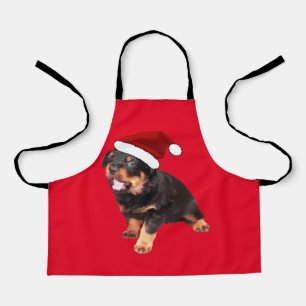 Cute Rottweiler Puppy Wearing Cartoon Santa Hat Apron