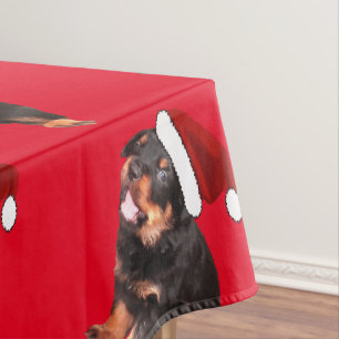 Cute Rottweiler Puppy Wearing Cartoon Santa Hat Tablecloth