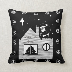 Cute santa with sack on roof black and white cushion