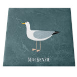 Cute Seagull Name Ceramic Tile<br><div class="desc">A cheeky seagull standing by the ocean. Perfect for those who love sassy birds and the coast.
Customise it by changing or removing the name.</div>