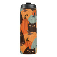 Cute seamless pattern with black cats and pumpkins
